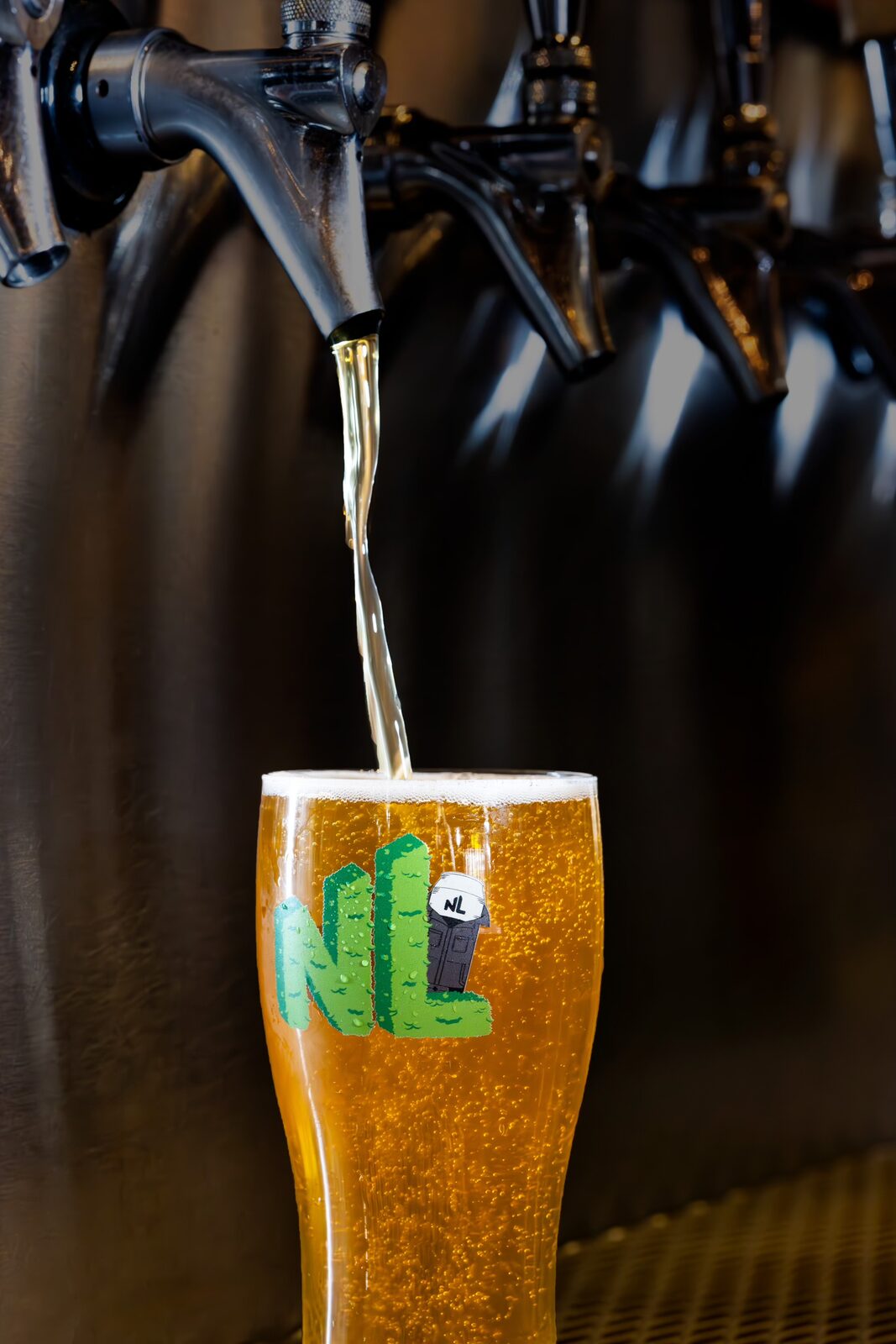 No Label beer pouring from a tap